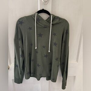 Green hoodie with stars